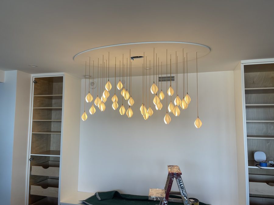 Pendant array over a dining room, custom ceiling recess