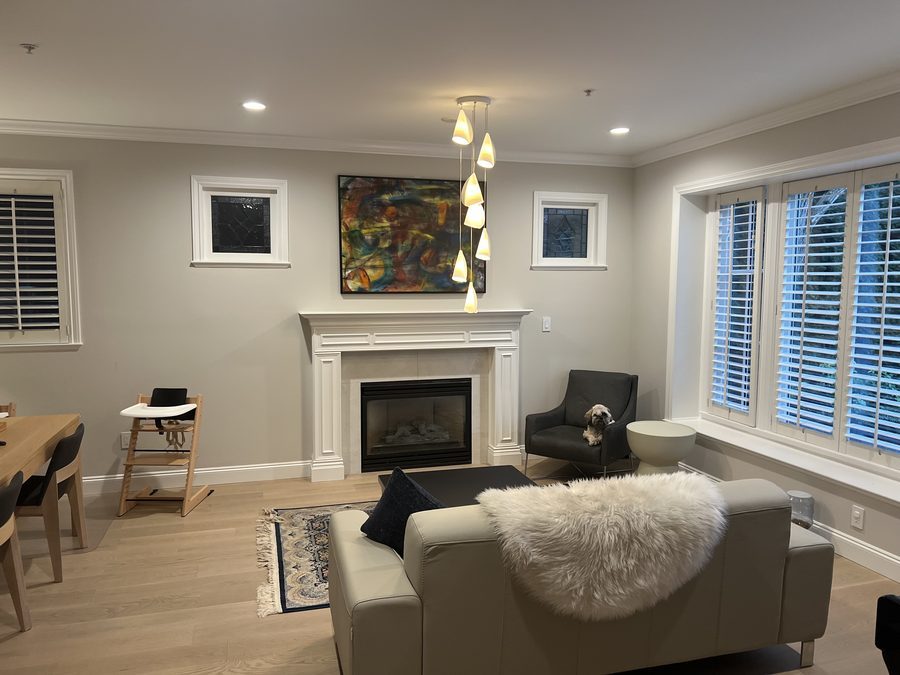 Pot lights and a pendant cluster, living room